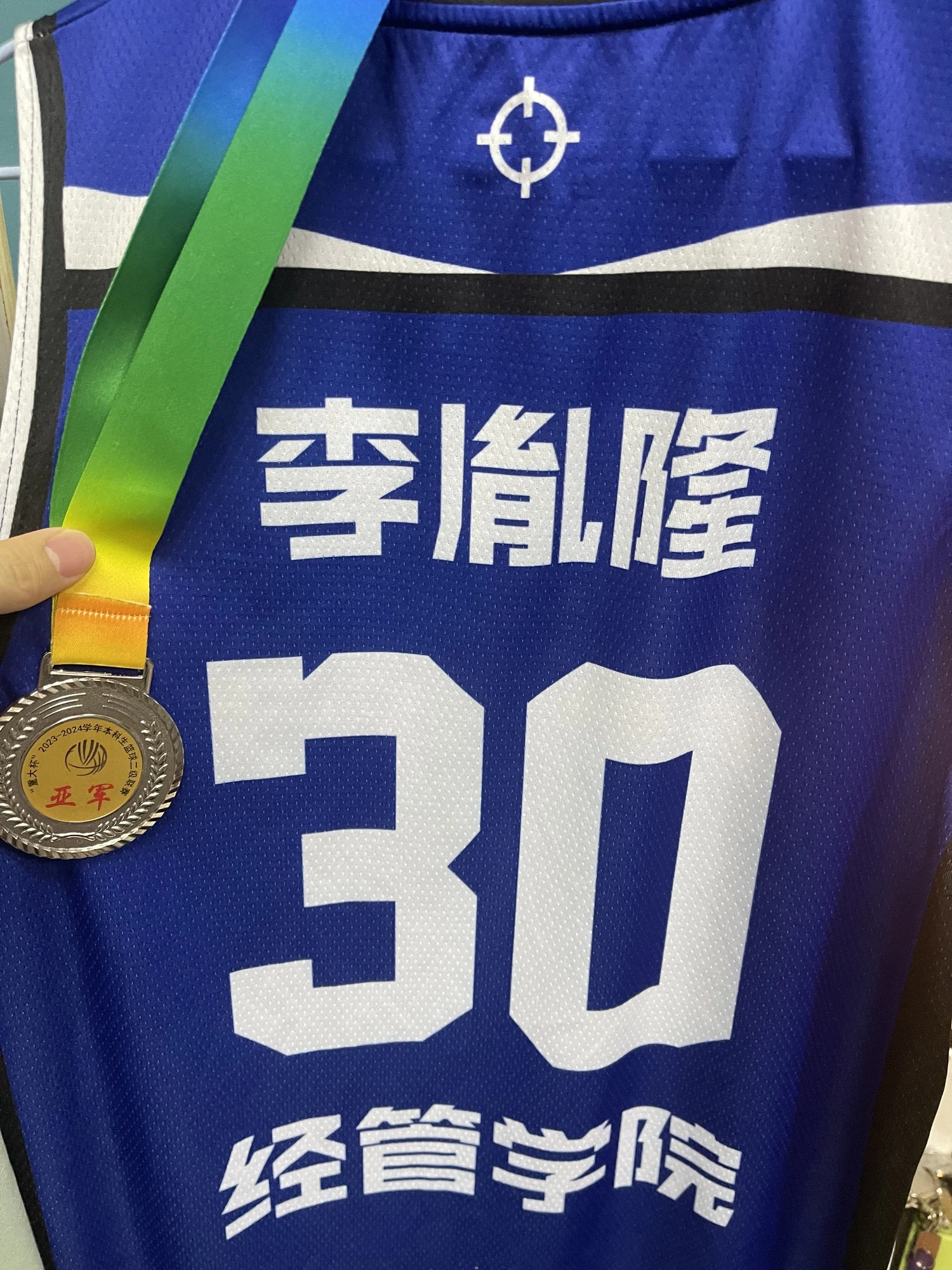 Basketball jersey number 30 with runner-up medal